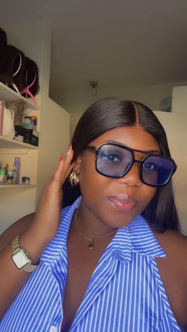shades on, still unmistakably her
