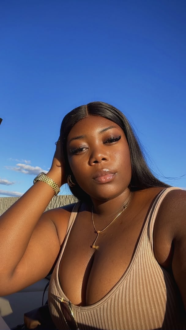 sun behind her, calm in it